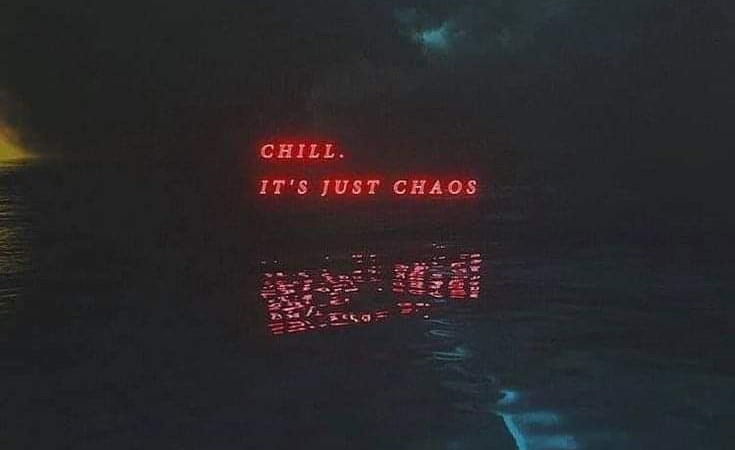 Dark clouds and ocean, above the water line is written: chill it's just chaos.